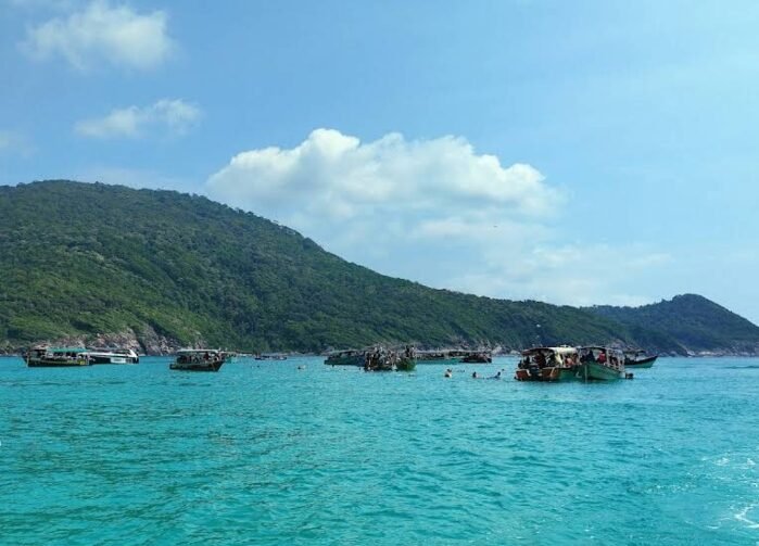 Tropical island sea and snorkeling concept